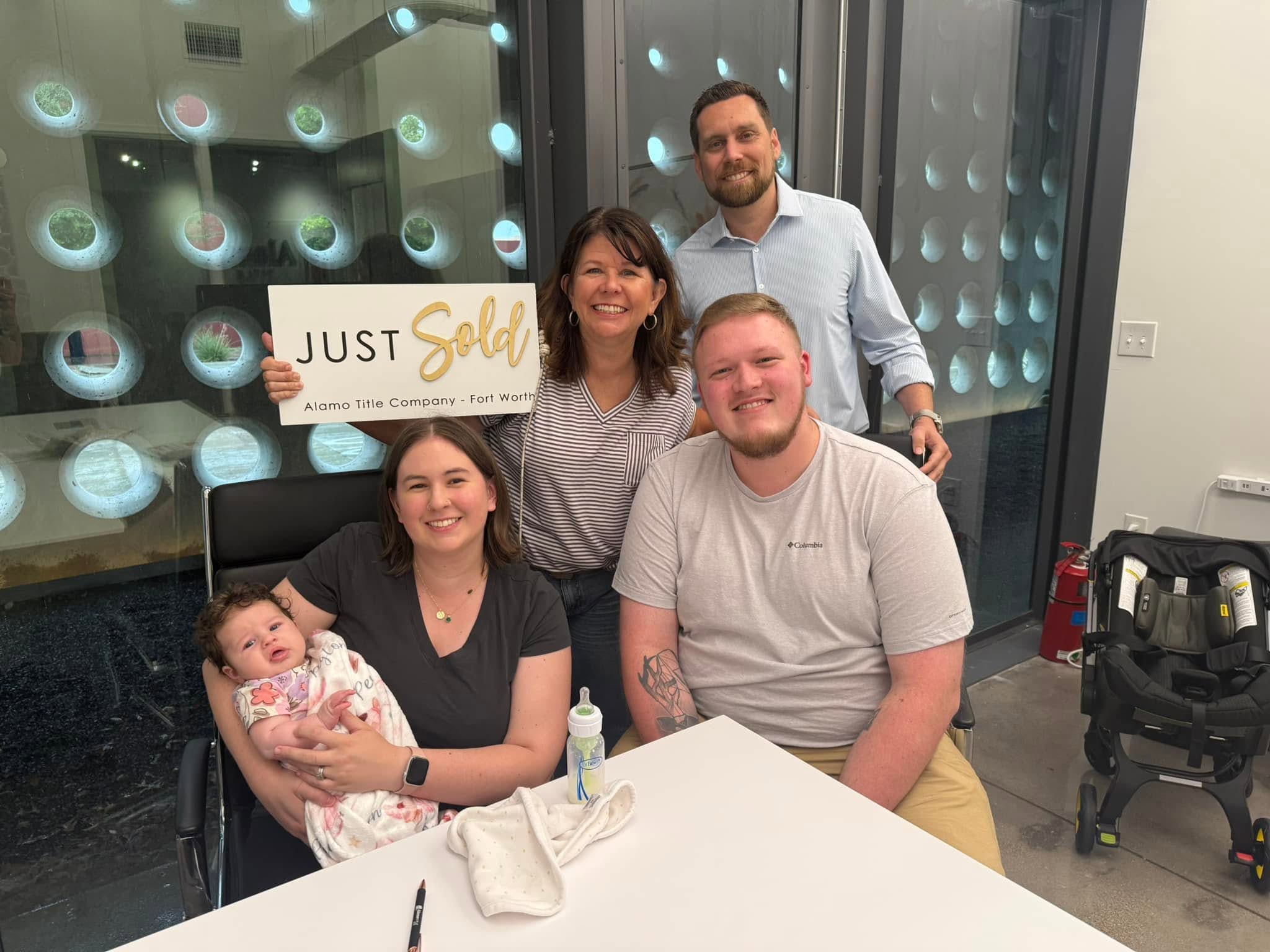 A happy family at their closing